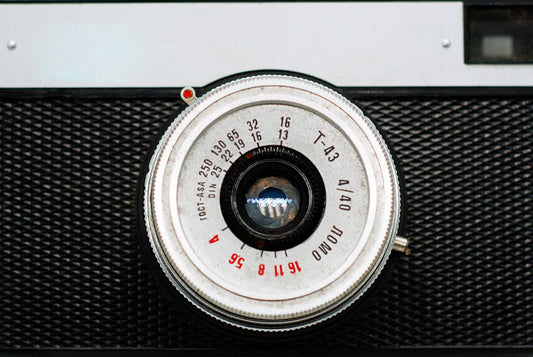 A close up of a camera with a lens